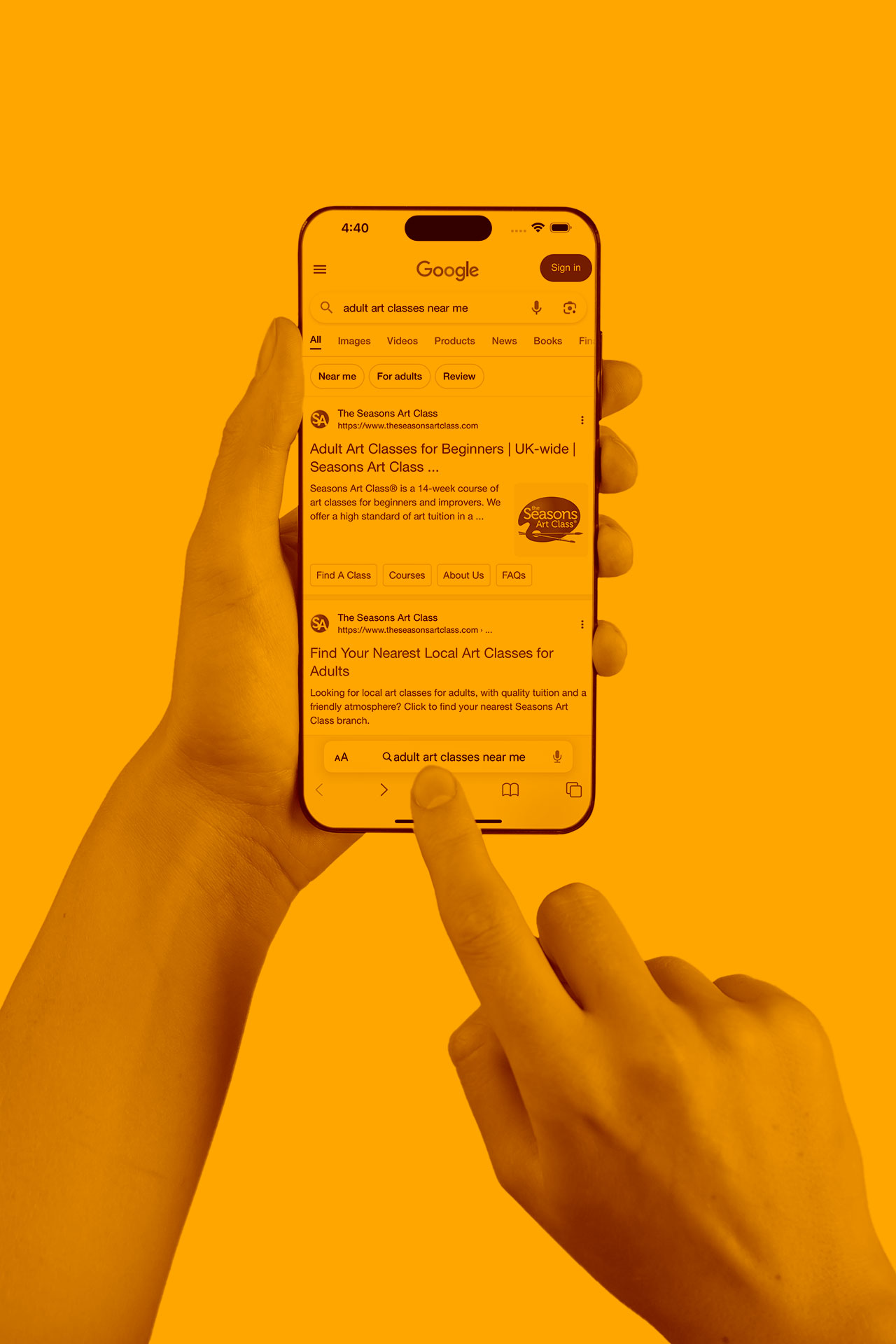 Hands holding a smartphone displaying PPC (Pay Per Click) advertising results, emphasizing digital marketing strategies.